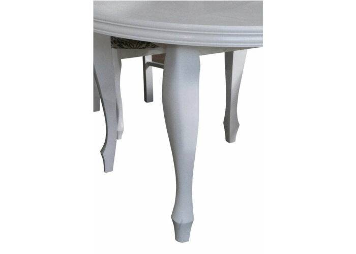 Okrągły rozkładany stół Cezar i drewniane krzesła A37 z tapicerowanym siedziskiem i oparciem