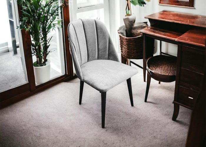 Eleganckie tapicerowane krzesło Tux z przeszyciami na oparciu