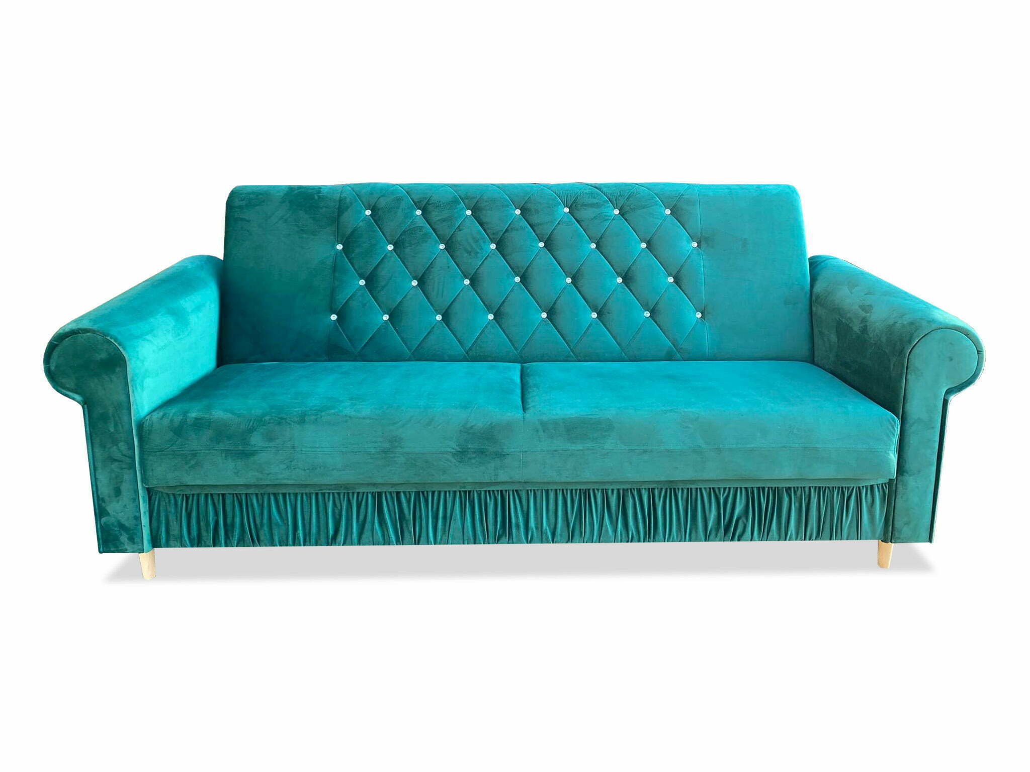 Zielona kanapa w salonie - z czym ją połączyć?